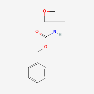 molecular formula C12H15NO3 B1527434 N-(3-甲基氧杂环丁-3-基)甲苯基氨基甲酸苄酯 CAS No. 1349988-69-7