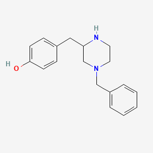 molecular formula C18H22N2O B15276465 4-((4-Benzylpiperazin-2-yl)methyl)phenol 