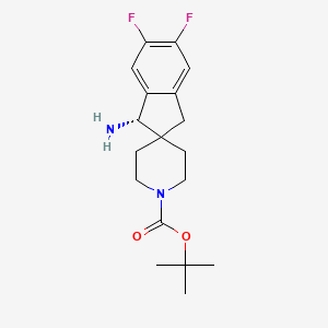 (S)-tert-Butyl 1-amino-5,6-difluoro-1,3-dihydrospiro[indene-2,4'-piperidine]-1'-carboxylate