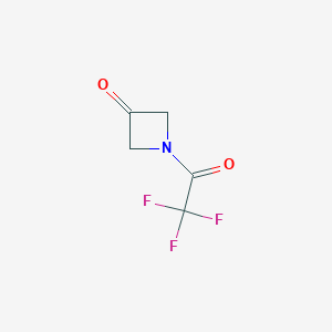 molecular formula C5H4F3NO2 B1528990 1-(2,2,2-三氟乙酰)氮杂环丁-3-酮 CAS No. 1803610-57-2