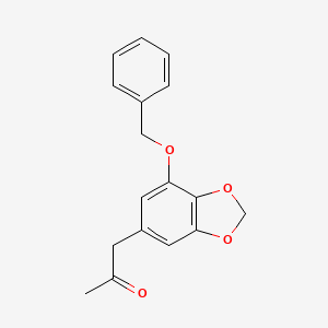 molecular formula C17H16O4 B1529218 1-(7-Benzyloxy-benzo[1,3]dioxol-5-yl)-propan-2-one CAS No. 1965309-90-3