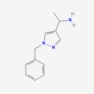 molecular formula C12H15N3 B1529272 1-(1-Benzyl-1H-pyrazol-4-yl)-ethylamine CAS No. 1339872-02-4