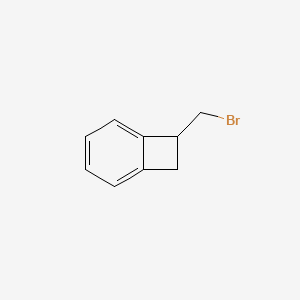 molecular formula C9H9Br B15296916 7-(Bromomethyl)bicyclo[4.2.0]octa-1,3,5-triene 