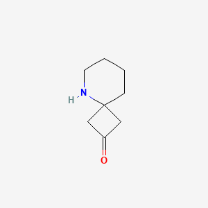 molecular formula C8H13NO B15299291 5-Azaspiro[3.5]nonan-2-one 