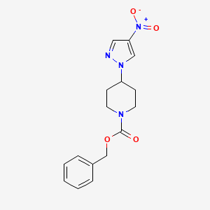 molecular formula C16H18N4O4 B15301813 benzyl 4-(4-nitro-1H-pyrazol-1-yl)piperidine-1-carboxylate 