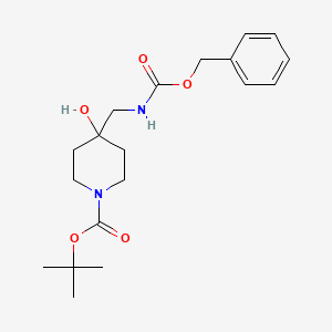 molecular formula C19H28N2O5 B15306261 Tert-butyl 4-((((benzyloxy)carbonyl)amino)methyl)-4-hydroxypiperidine-1-carboxylate 