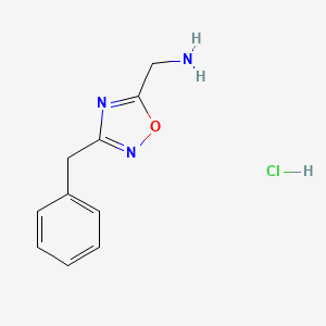 molecular formula C10H12ClN3O B1530977 (3-Benzyl-1,2,4-oxadiazol-5-yl)methanamine hydrochloride CAS No. 1185301-35-2