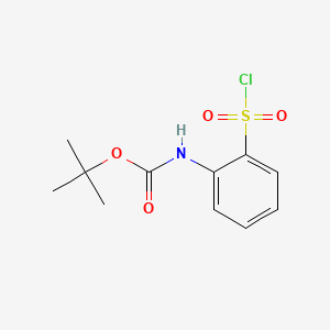 molecular formula C11H14ClNO4S B15309876 tert-Butyl (2-(chlorosulfonyl)phenyl)carbamate 