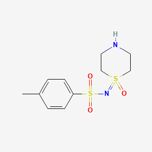 molecular formula C11H16N2O3S2 B15309890 4-methyl-N-(1-oxo-1lambda6-thiomorpholin-1-ylidene)benzene-1-sulfonamide 