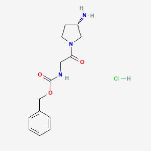 molecular formula C14H20ClN3O3 B1531390 S [2-(3-Aminopyrrolidin-1-yl)-2-oxo-ethyl]carbamic acid benzyl ester hydrochloride CAS No. 2206820-89-3