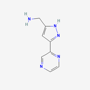 molecular formula C8H9N5 B1531942 (3-(pyrazin-2-yl)-1H-pyrazol-5-yl)methanamine CAS No. 1350478-03-3