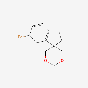 molecular formula C12H13BrO2 B15320402 6'-Bromo-2',3'-dihydrospiro[1,5-dioxane-3,1'-indene] 