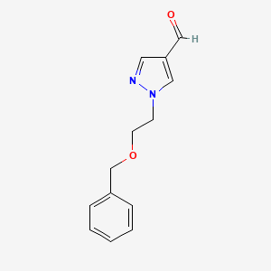 molecular formula C13H14N2O2 B1532060 1-[2-(benzyloxy)ethyl]-1H-pyrazole-4-carbaldehyde CAS No. 1859656-91-9