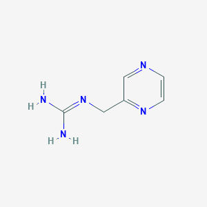 molecular formula C6H9N5 B15332523 1-(2-Pyrazinylmethyl)guanidine 