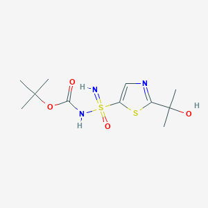 molecular formula C11H19N3O4S2 B15332692 N-Boc-2-(2-hydroxy-2-propyl)thiazole-5-sulfonimidamide 