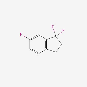 molecular formula C9H7F3 B15338933 1,1,6-Trifluoroindan 