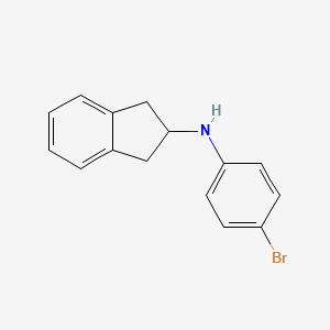 molecular formula C15H14BrN B15339390 N-(4-bromophenyl)-2,3-dihydro-1H-inden-2-amine 