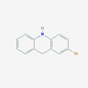 molecular formula C13H10BrN B15359111 2-Bromo-9,10-dihydroacridine 