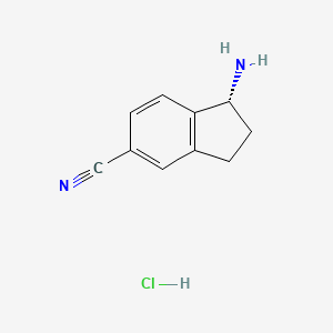 molecular formula C10H11ClN2 B15359783 (1R)-1-aminoindane-5-carbonitrile;hydrochloride 