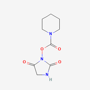 molecular formula C9H13N3O4 B15359956 (2,5-Dioxoimidazolidin-1-yl) piperidine-1-carboxylate 