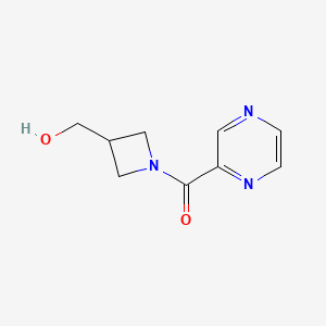 molecular formula C9H11N3O2 B15369868 (3-(Hydroxymethyl)azetidin-1-yl)(pyrazin-2-yl)methanone 