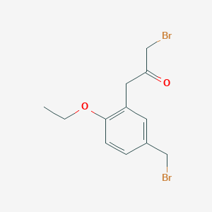 molecular formula C12H14Br2O2 B15383796 1-Bromo-3-(5-(bromomethyl)-2-ethoxyphenyl)propan-2-one 