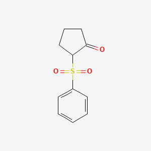 Cyclopentanone, 2-(phenylsulfonyl)-