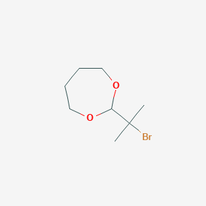 2-(2-Bromopropan-2-yl)-1,3-dioxepane