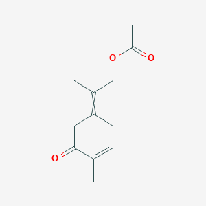 2-(4-Methyl-5-oxocyclohex-3-en-1-ylidene)propyl acetate