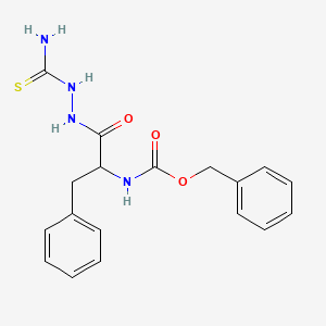 benzyl N-[1-(2-carbamothioylhydrazinyl)-1-oxo-3-phenylpropan-2-yl]carbamate