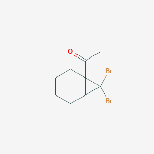 1-(7,7-Dibromobicyclo[4.1.0]heptan-1-yl)ethan-1-one