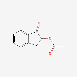 1H-Inden-1-one, 2-(acetyloxy)-2,3-dihydro-