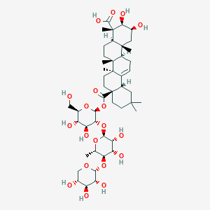 molecular formula C47H74O19 B15523496 (2S,3R,4S,4aR,6aR,6bS,8aS,12aS,14aR,14bR)-8a-[(2S,3R,4S,5S,6R)-3-[(2S,3R,4S,5R,6S)-3,4-dihydroxy-6-methyl-5-[(2R,3R,4S,5R)-3,4,5-trihydroxyoxan-2-yl]oxyoxan-2-yl]oxy-4,5-dihydroxy-6-(hydroxymethyl)oxan-2-yl]oxycarbonyl-2,3-dihydroxy-4,6a,6b,11,11,14b-hexamethyl-1,2,3,4a,5,6,7,8,9,10,12,12a,14,14a-tetradecahydropicene-4-carboxylic acid 