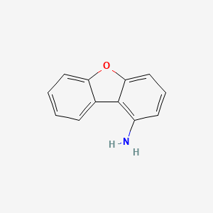 molecular formula C12H9NO B1581269 1-二苯并呋喃胺 CAS No. 50548-40-8