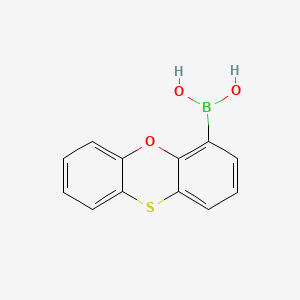B1586525 Phenoxathiin-4-boronic acid CAS No. 100124-07-0