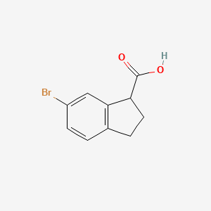 molecular formula C10H9BrO2 B1590553 6-Bromo-2,3-dihydro-1H-indene-1-carboxylic acid CAS No. 52651-16-8