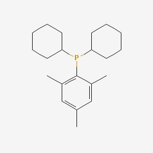 B1591322 Dicyclohexyl(mesityl)phosphine CAS No. 870703-48-3