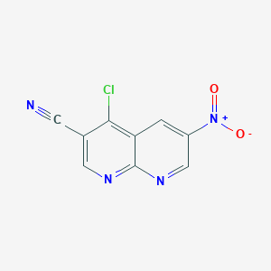 molecular formula C9H3ClN4O2 B1591531 4-氯-6-硝基-1,8-萘啶-3-腈 CAS No. 305370-84-7