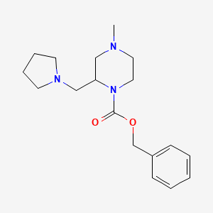 B1597531 4-Methyl-2-pyrrolidin-1-ylmethyl-piperazine-1-carboxylic acid benzyl ester CAS No. 675602-56-9