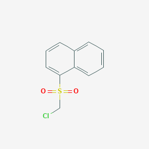B1599803 1-((Chloromethyl)sulfonyl)naphthalene CAS No. 87491-79-0
