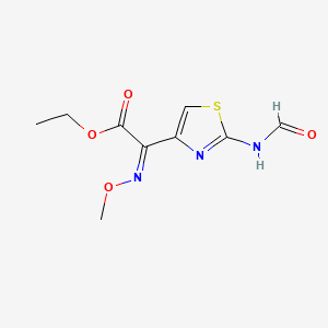 molecular formula C9H11N3O4S B1600902 Ethyl (Z)-2-formamido-alpha-(methoxyimino)thiazol-4-acetate CAS No. 66340-98-5