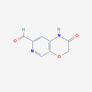B1602881 2-Oxo-2,3-dihydro-1H-pyrido[3,4-b][1,4]oxazine-7-carbaldehyde CAS No. 615568-80-4