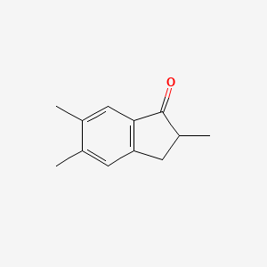 molecular formula C12H14O B1603468 2,5,6-Trimethyl-2,3-dihydro-1H-inden-1-one CAS No. 89044-51-9