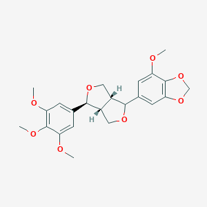 molecular formula C23H26O8 B160364 6-[(3aR,6S,6aR)-6-(3,4,5-trimethoxyphenyl)-1,3,3a,4,6,6a-hexahydrofuro[3,4-c]furan-3-yl]-4-methoxy-1,3-benzodioxole CAS No. 77449-31-1