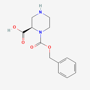 molecular formula C13H16N2O4 B1604447 (R)-1-((Benzyloxy)carbonyl)piperazine-2-carboxylic acid CAS No. 1139878-81-1