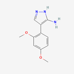 molecular formula C11H13N3O2 B1605482 4-(2,4-Dimethoxyphenyl)-1H-pyrazol-3-amine CAS No. 909858-12-4