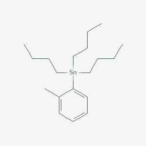 B1608940 Tributyl(2-methylphenyl)stannane CAS No. 68971-87-9