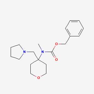 B1608970 Methyl-(4-pyrrolidin-1-ylmethyl-tetrahydro-pyran-4-yl)-carbamic acid benzyl ester CAS No. 886363-06-0