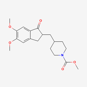 B1609755 Methyl 4-((5,6-dimethoxy-1-oxo-2,3-dihydro-1H-inden-2-yl)methyl)piperidine-1-carboxylate CAS No. 192701-59-0