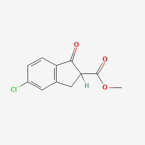 B1610143 1H-Indene-2-carboxylic acid, 5-chloro-2,3-dihydro-1-oxo-, methyl ester CAS No. 65738-56-9